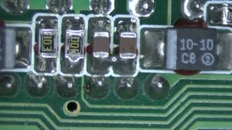   solder bridge on C64+C65 is normal  