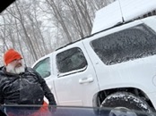   snow piling up on the cars  